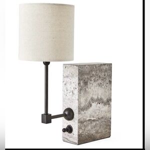 Uttermost On a Shelf Mini Lamp with a travertine base and bronze finish.